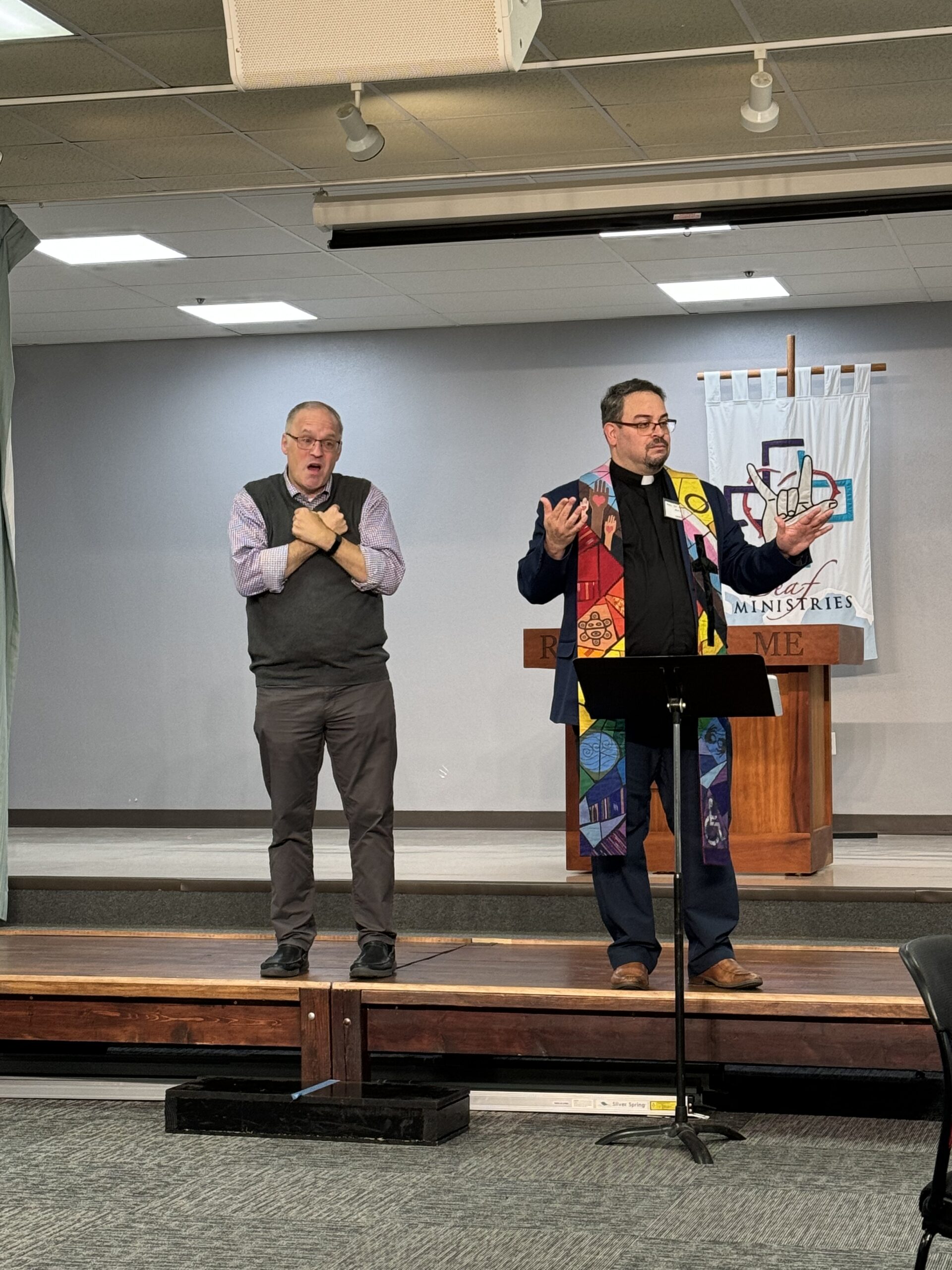 Rev. Dr. Kirk VanGilder speaking through an interpreter