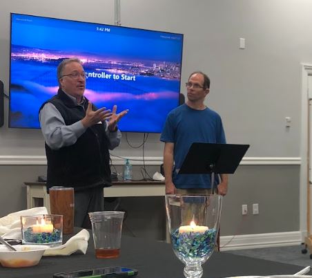Rev. Dr. Tom Hudspeth and Billy Deters speaking to the UMCD conference in 2023.